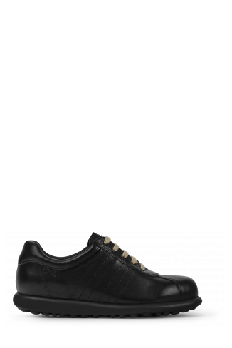 Side view of Pelotas Iconic black shoe for women