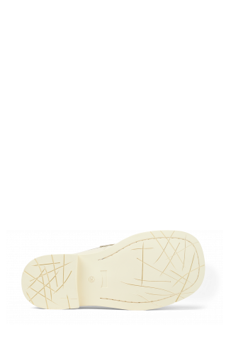 The soles of MIL 1978 White Leather Moccasin