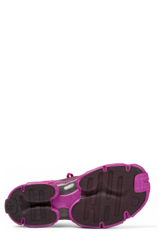 The soles of Tossu Purple caged sneakers