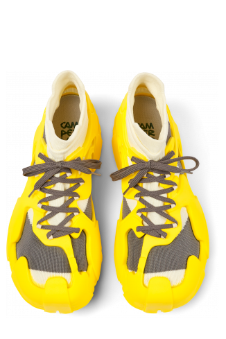 Overhead view of Tossu Yellow caged sneakers