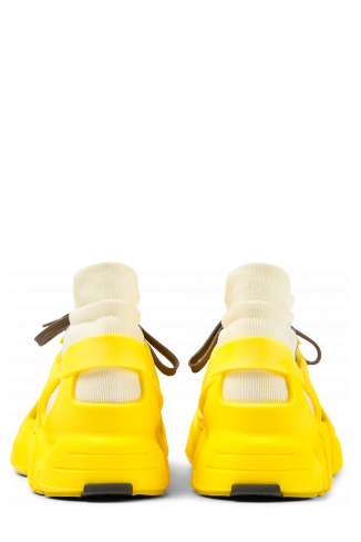 Back view of Tossu Yellow caged sneakers