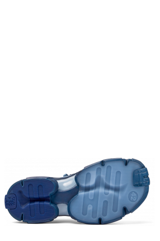 The soles of Tossu Blue caged sneakers