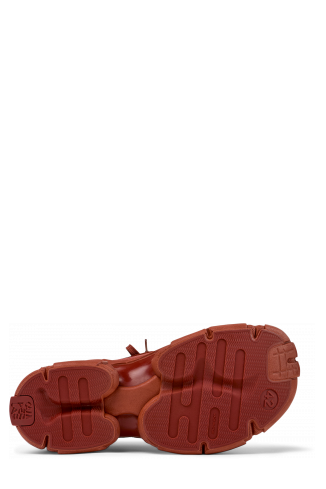 The soles of Tossu Red Synthetic Sneaker
