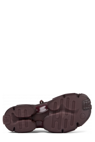 The soles of Tossu Burgundy Caged Sneakers