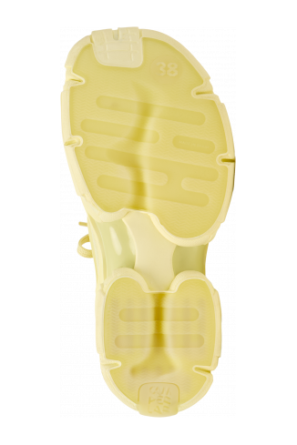 The soles of Tossu Yellow Caged Sneakers
