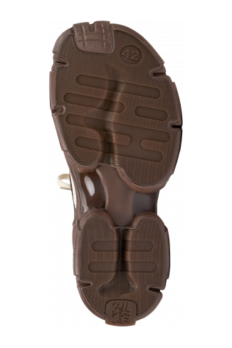 The soles of Tossu White-Gray Caged Sneakers