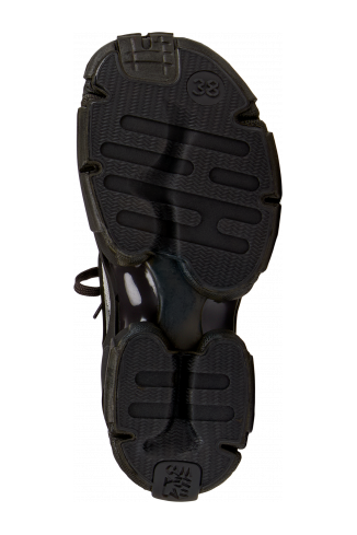 The soles of Tossu Gray Caged Sneakers