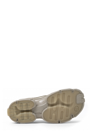The soles of Tossu x CONCEPT(K) Stone Gray Sneakers