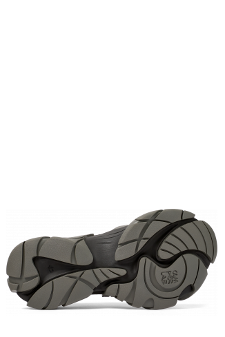 The soles of Tormenta Black and gray sneakers
