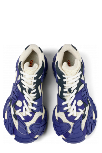 Overhead view of Tormenta Blue and white sneakers