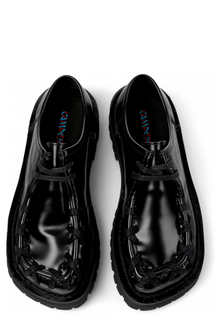 Overhead view of Eki Black leather shoes