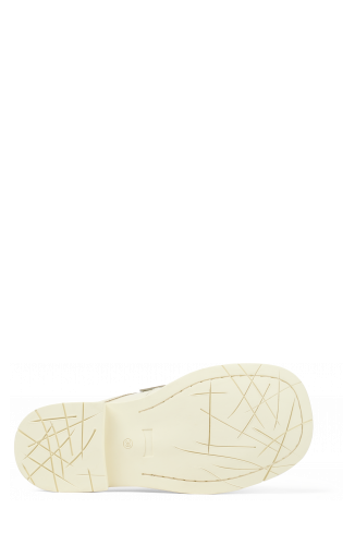 The soles of MIL 1978 White leather loafer slide