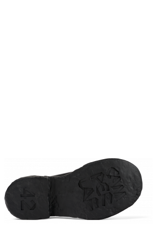 The soles of Vamonos Black Leather Lace-Up Shoes