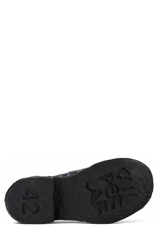 The soles of Vamonos Gray Leather Loafers