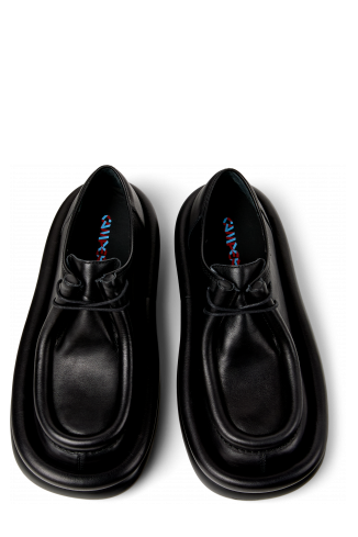 Overhead view of AQUA Black leather shoes