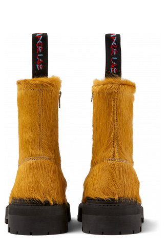 Back view of Eki Dark yellow long calf hairboots