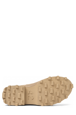 The soles of Traktori Beige leather boots