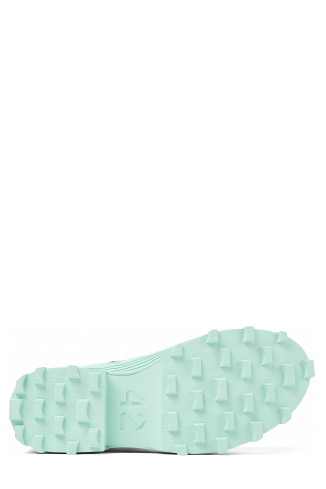The soles of Traktori Light green leather boots