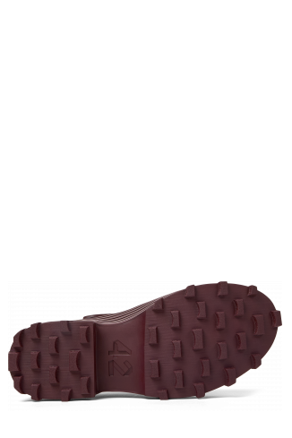 The soles of Traktori Burgundy Leather Boots
