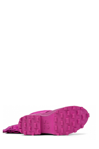 The soles of Traktori Purple padded high boots