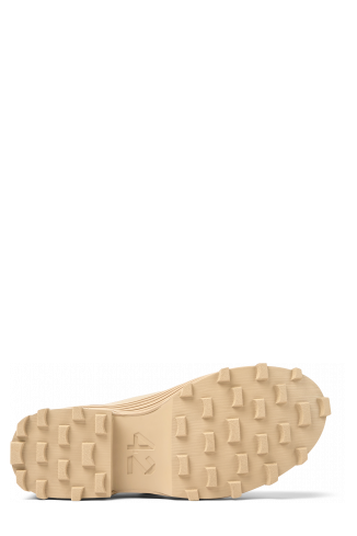 The soles of Traktori Beige ankle boots