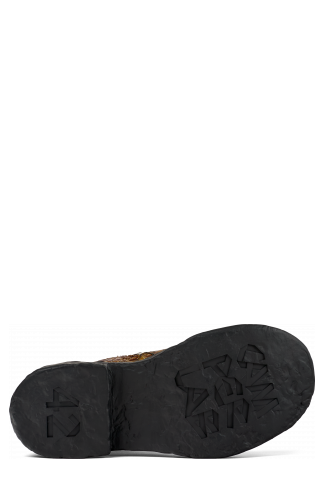 The soles of Vamonos Brown Leather Boots