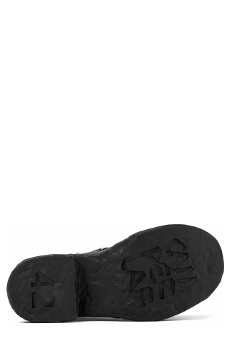 The soles of Vamonos Gray-Black Leather Boots