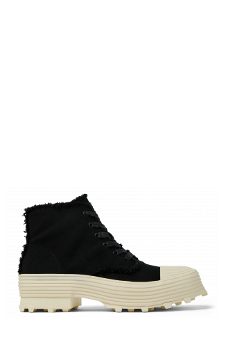 Side view of TRAKTORI Black TENCEL™ Boots