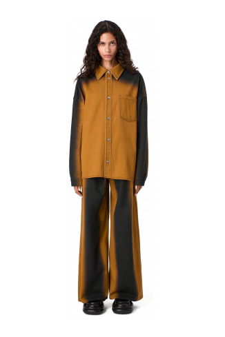 SPRAY PRINT DENIM JEANS Texans bootcut de color terracota estampat amb un efecte d’esprai