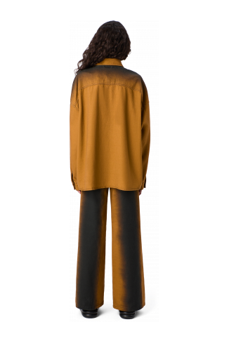 SPRAY PRINT DENIM JEANS Texans bootcut de color terracota estampat amb un efecte d’esprai