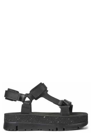 Side view of Oruga Up Black leather sandals for women