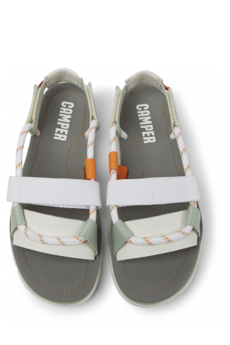 Overhead view of Oruga White, green, and orange sandals for women