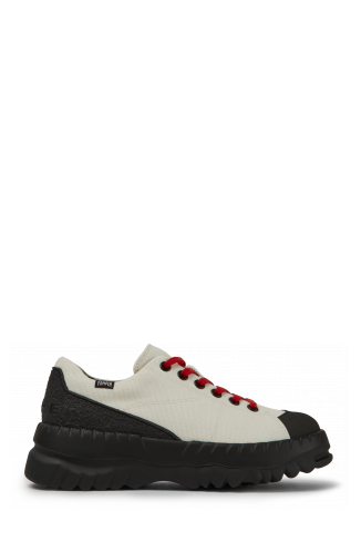 Side view of Teix White rubber and BCI cotton shoes