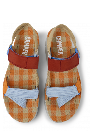 Overhead view of Oruga Up Beige, blue, and red sandals for women