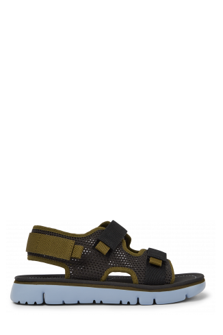 Side view of Oruga Grey, green, and black sandals for women