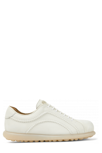 Side view of Pelotas White non-dyed leather sneakers for women