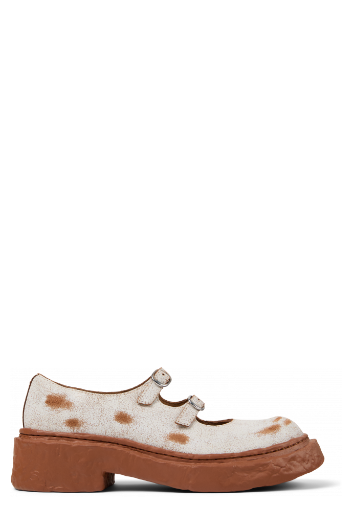 Side view of VAMONOS White cracked Leather Mary Janes