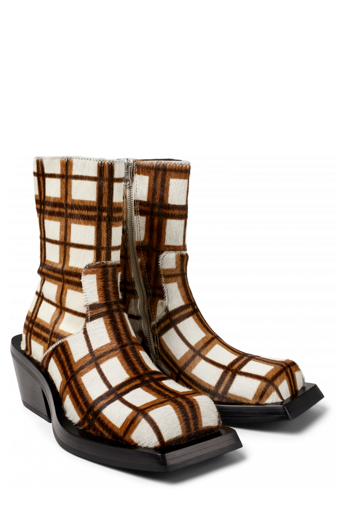 Front view of QUETAL Cream-brown tartan hair-on-leather boots