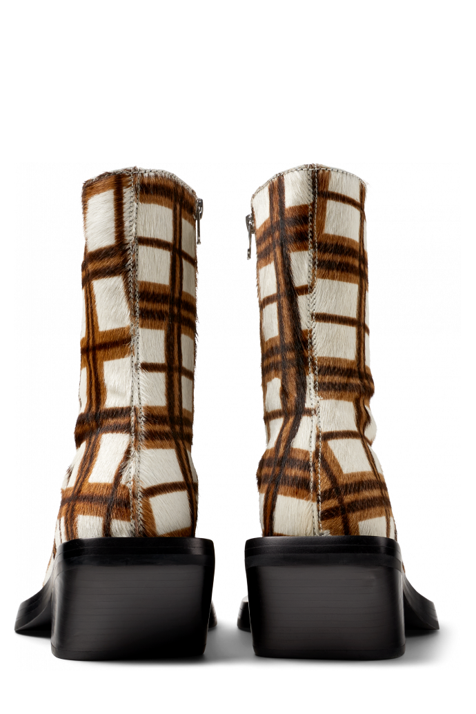 Back view of QUETAL Cream-brown tartan hair-on-leather boots