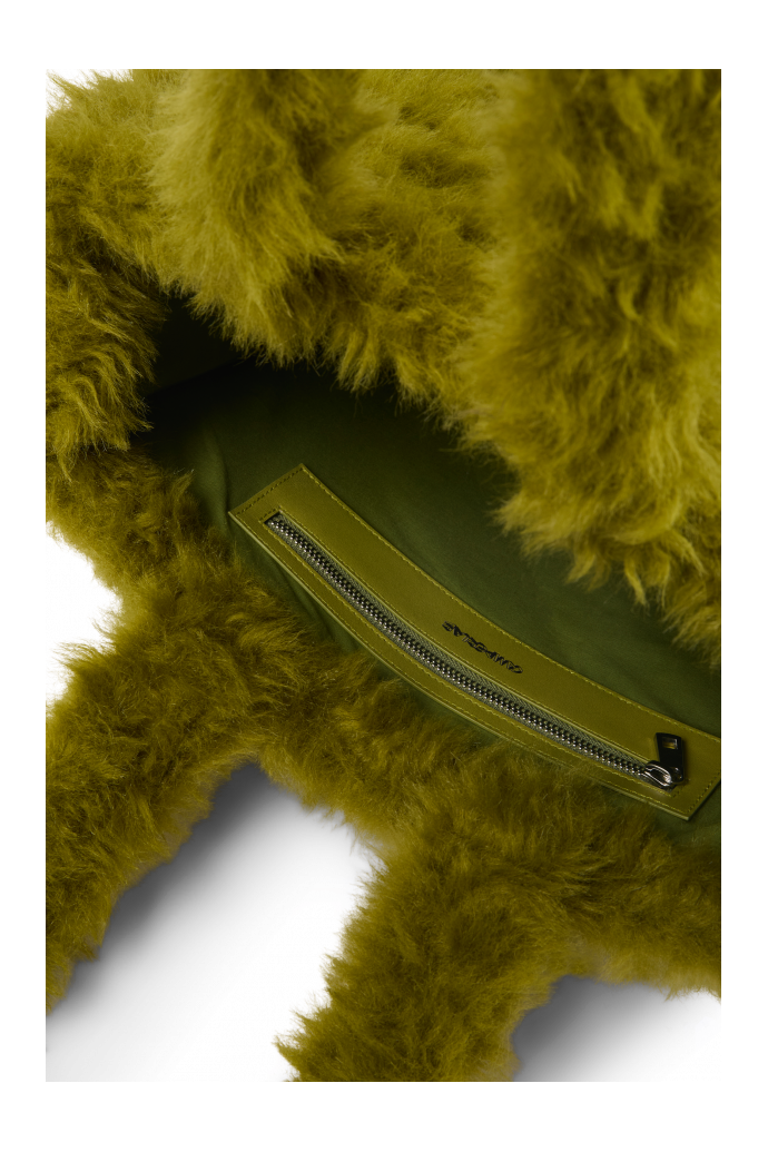 Overhead view of TAKKU Green textured tote