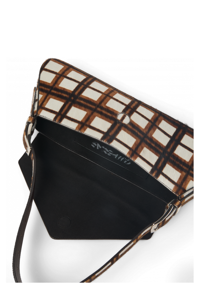 Overhead view of KIRJE Cream-brown tartan hair-on-leather handbag