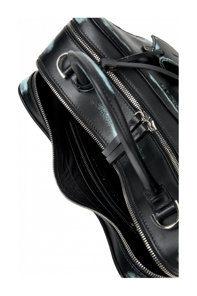 Overhead view of LUNSSI LUNSSI Leather Distorted Shoulder Bag in Black-Turquoise