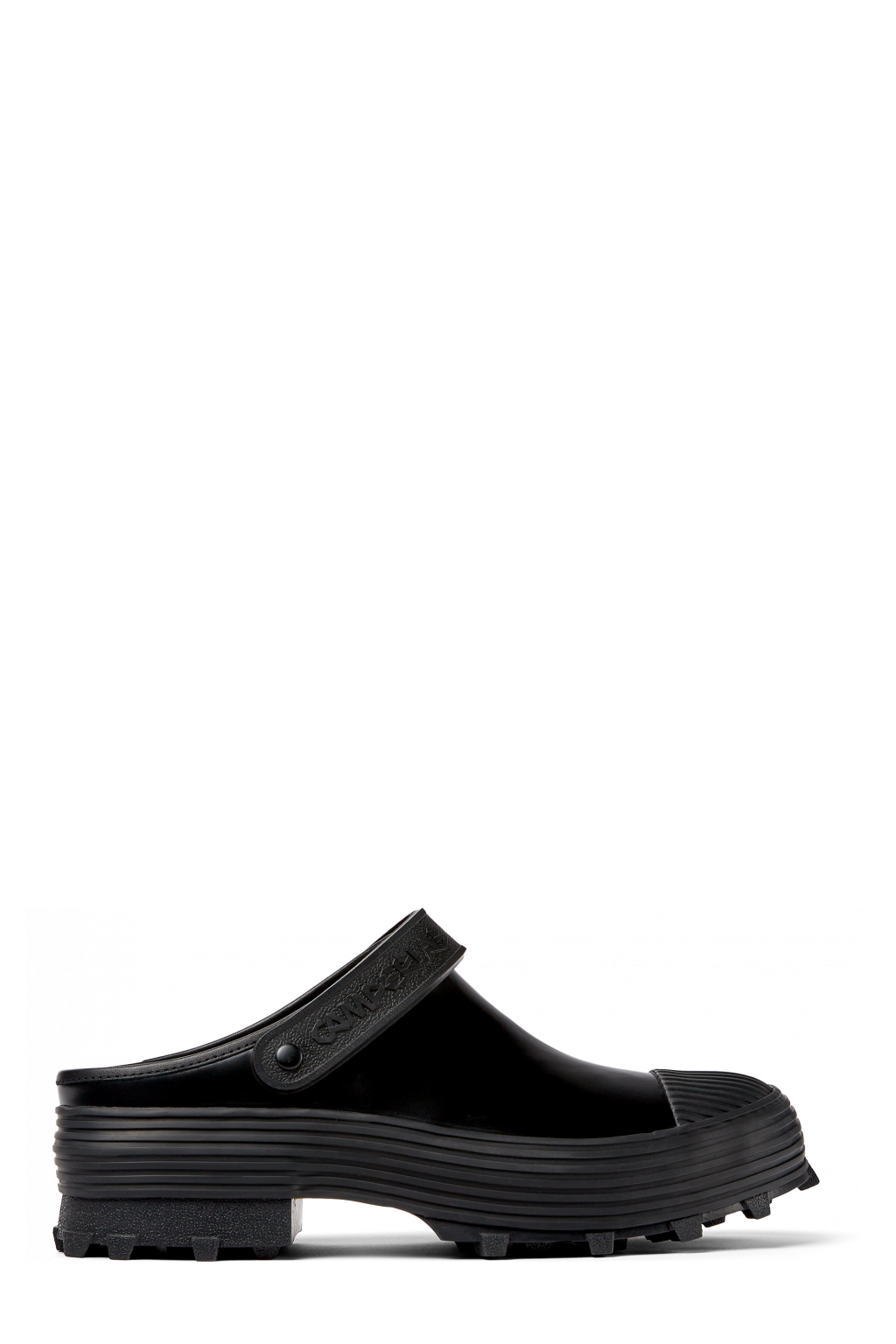 Side view of TRAKTORI Black Leather Clogs