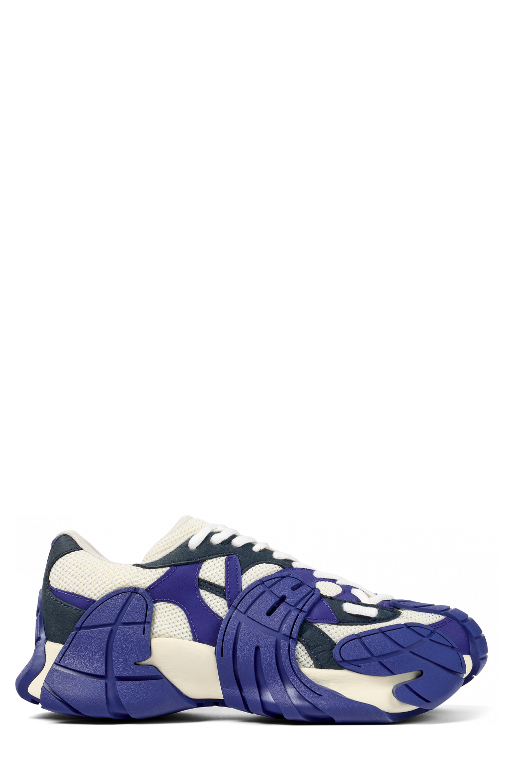 Side view of Tormenta Blue and white sneakers