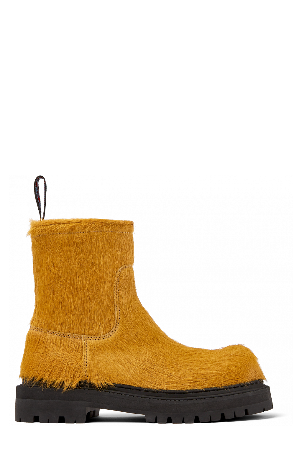 Side view of Eki Dark yellow long calf hairboots